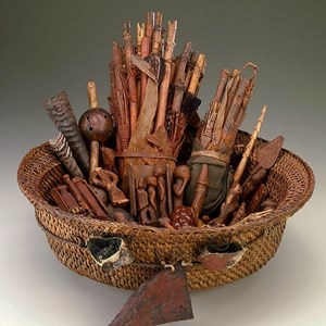 Ngombo ya Cisuka, cesto de adivinhação na tradição Tshokwe.