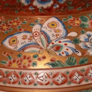 Pormenor da decoração: uma borboleta.